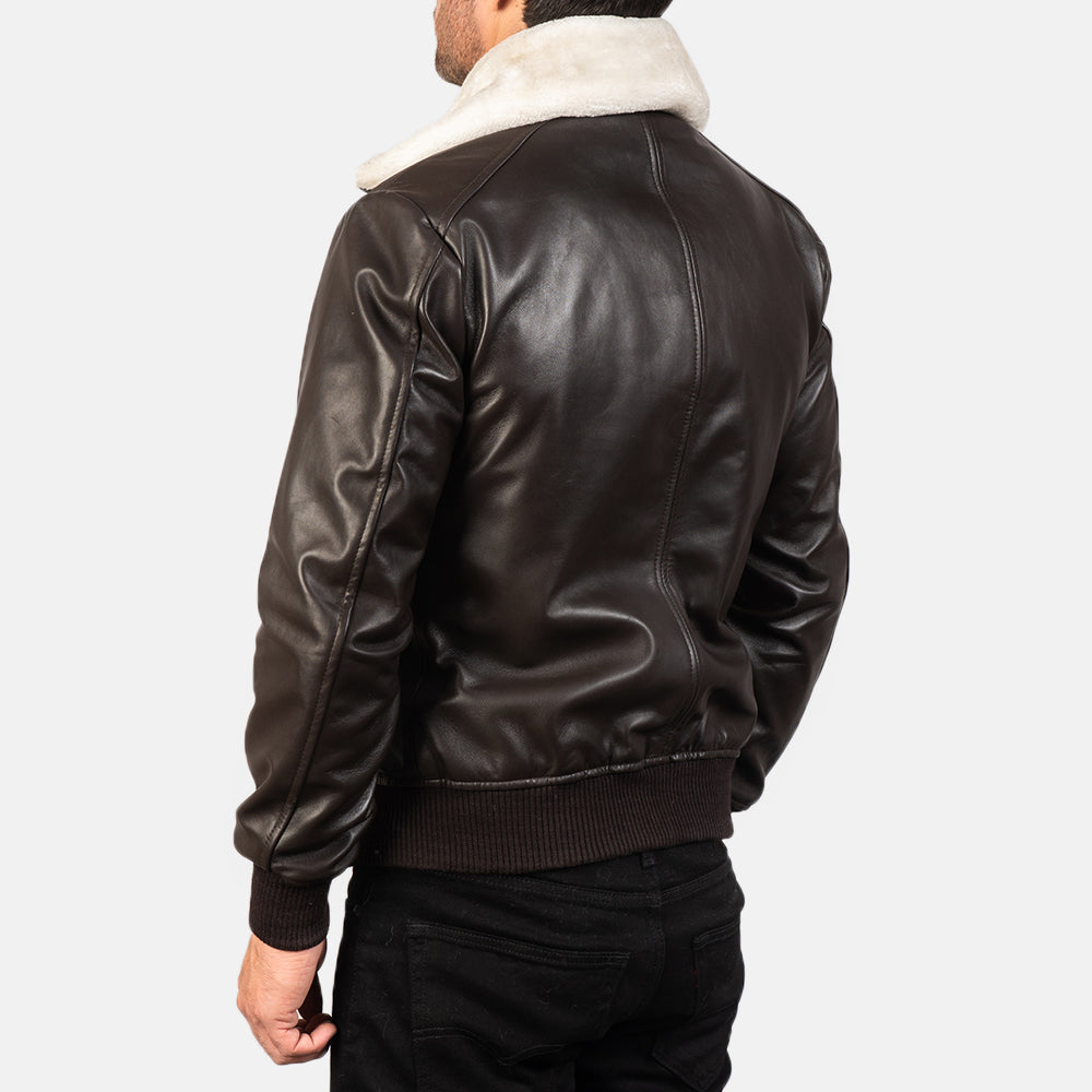 Detailed shot of the brown leather jacket with white fur detailing
