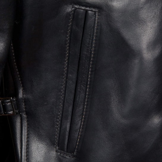 Close-up of leather jacket with pockets