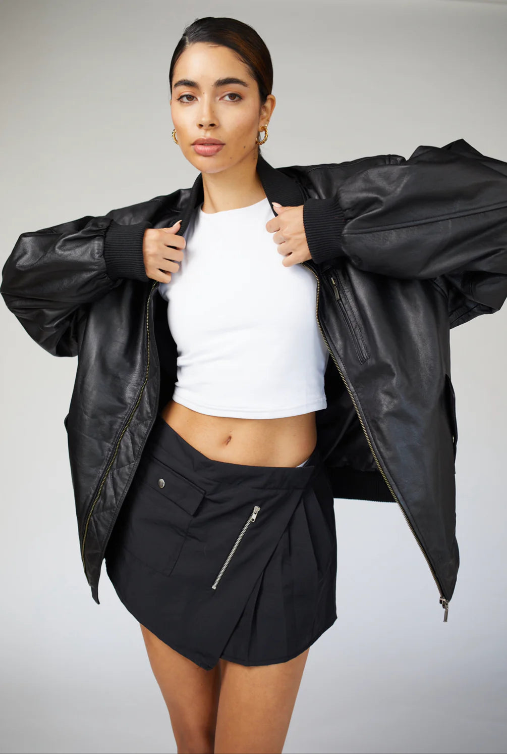 Front view of 90s-Inspired Oversized Bomber Leather Jacket for Women